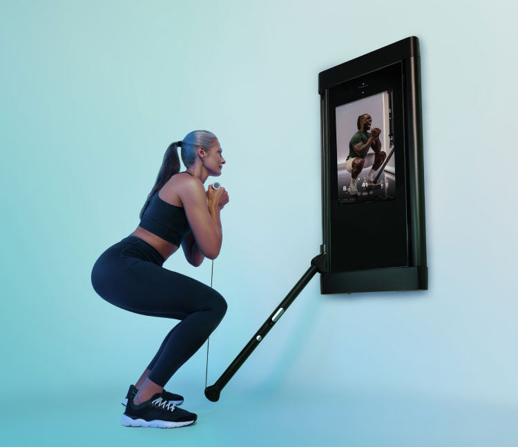 Woman doing class on Tonal Machine
