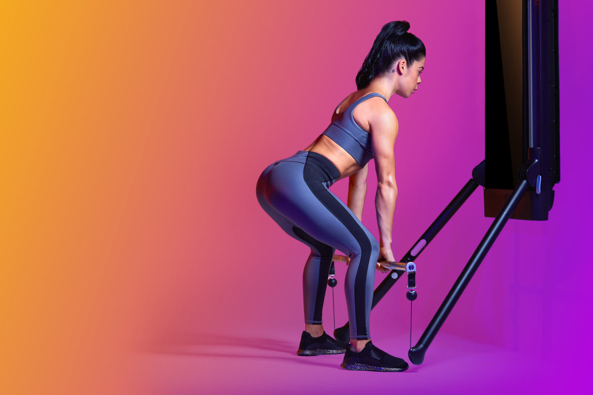image of a woman doing a barbell Romanian deadlift