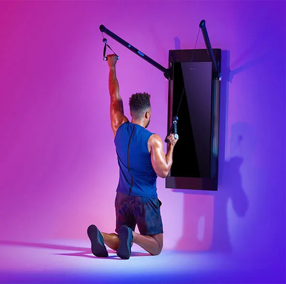 Person working out with a Tonal Resistance trainer