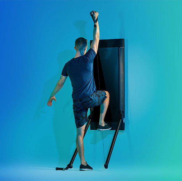 Person working out with a Tonal Resistance trainer