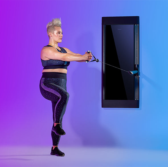 Person working out with a Tonal Resistance trainer