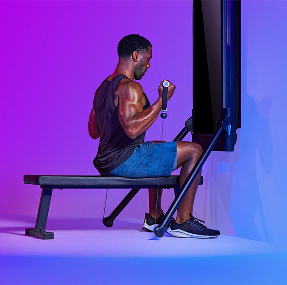 Person working out with a Tonal Resistance trainer