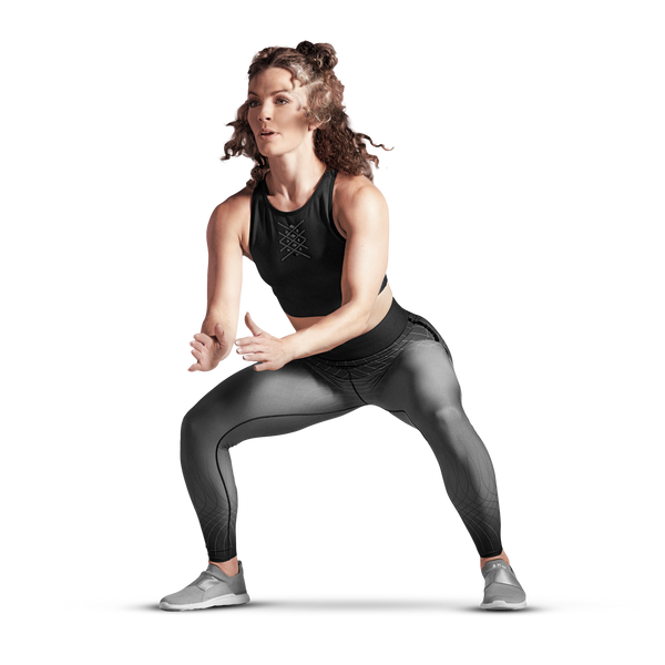 Woman performing bodyweight squats