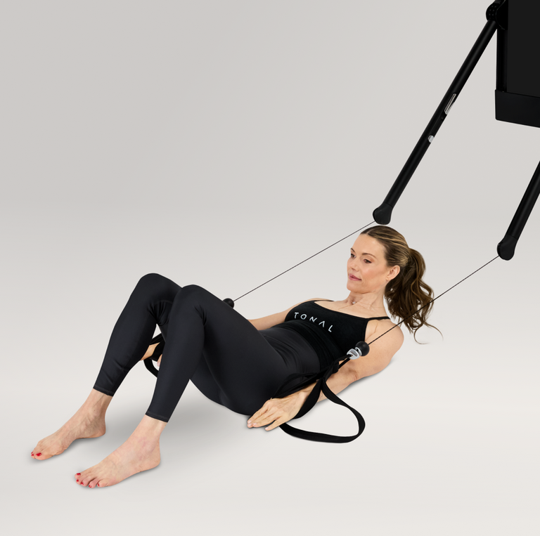 Supine Arms C Curve movement Pilates with a Tonal machine