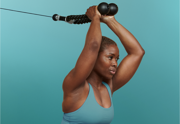 Women using the Rope attachment with Tonal machine